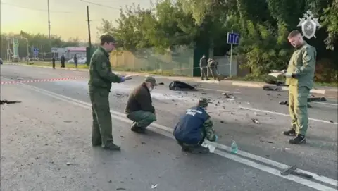 Russian Investigative Committee Russian police search a street near Moscow after the killing of a Russian nationalist's daughter, Darya Dugina