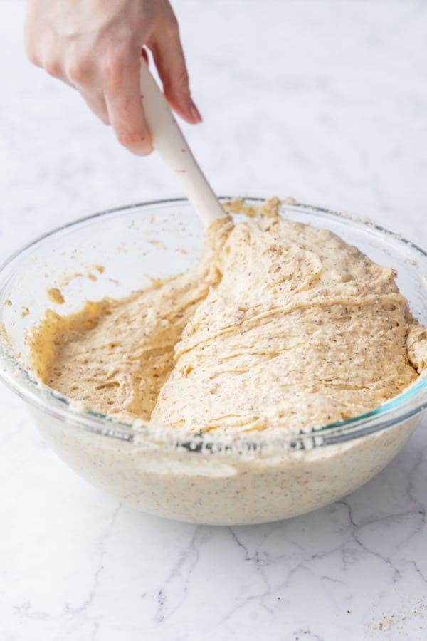 Folding in the rest of the hazelnut flour.